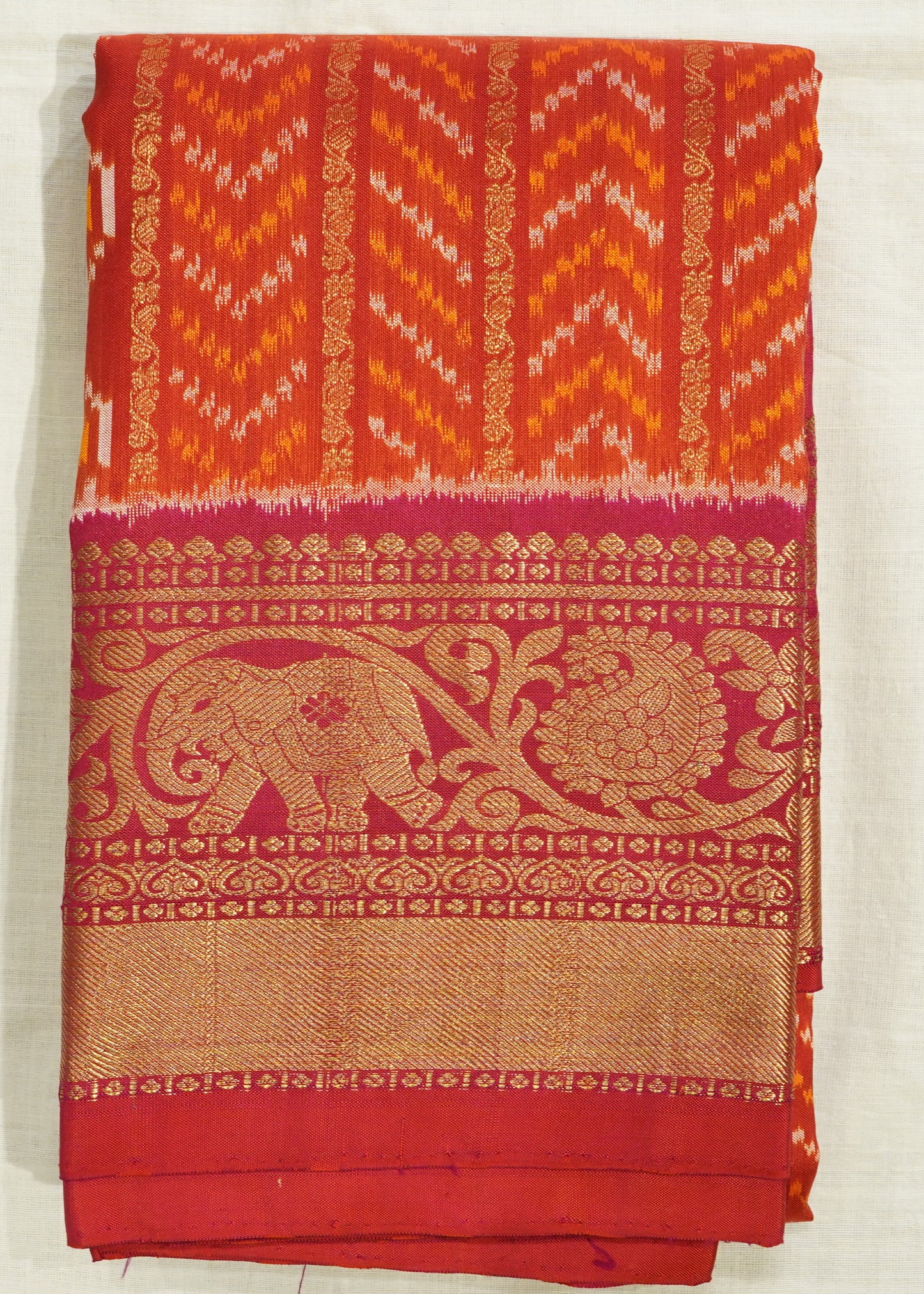 Orange Pochampally Ikkat All Over Kanchi Border Pure Silk Handloom Saree
