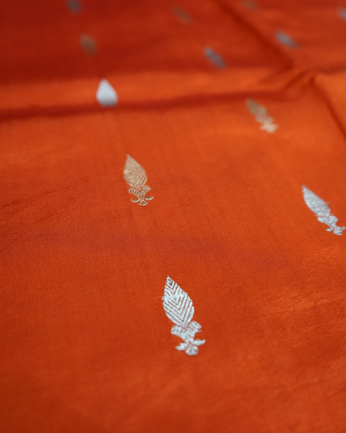 Orange Banaras Katan Silk Saree with Zari Border & Zari Buttis